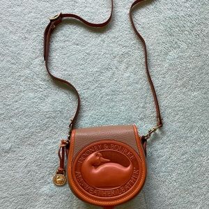 Dooney & Bourke All Weather Leather Duck Bag in caramel, new condition